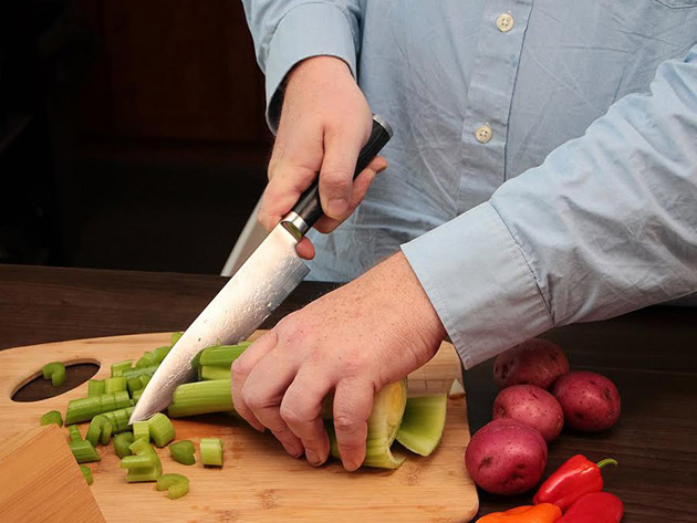 man chopping food