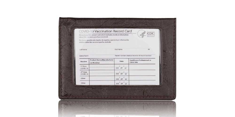 If you’re looking for something a little more elegant, you can opt for a classic leather cardholder. This little cardholder will fit in your pocket just like a wallet. In fact, not only does it hold your vaccine card, but it can also hold your ID and other credit cards. It’s durable and made of faux leather, while the see-through screen is made of PVC. It’s the perfect solution if you need to keep your vaccine card without waving it around on something like a lanyard.