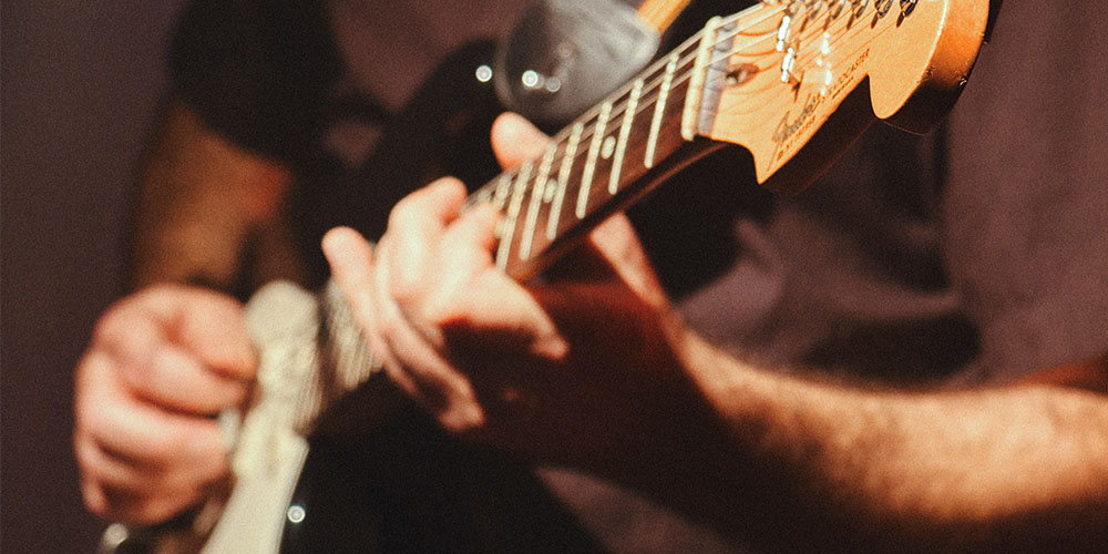 Guitar: Learn to Play 10 Guitar Songs Using Just 3 Chords