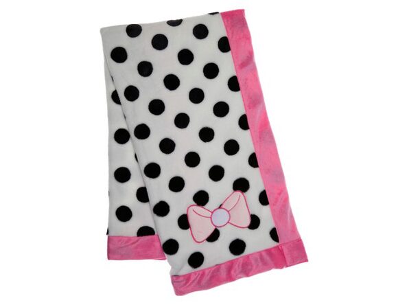 pink baby blanket with white polka dots